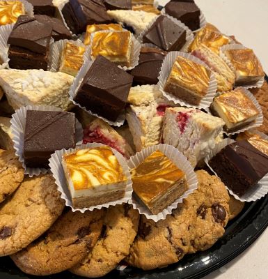 Image of a dessert party platter including a selection of dessert bars and brownies as well as chocolate chip cookies. Served at a small catered event by Simply Baked Catering Inc., Winchester, Ontario