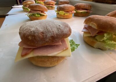 Ham and Swiss cheese sandwiches on a fresh-baked sourdough bun. Available for small or large catering orders in the greater Ottawa area.
